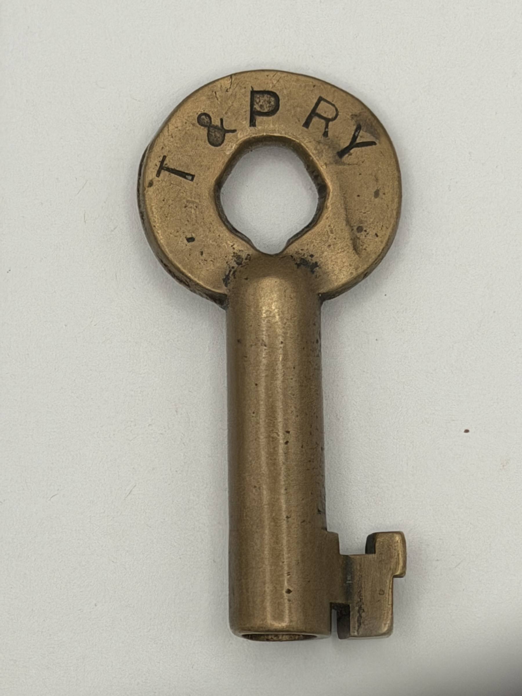 Texas and Pacific Railway Adlake (curved) Brass Switch Key T&PRY