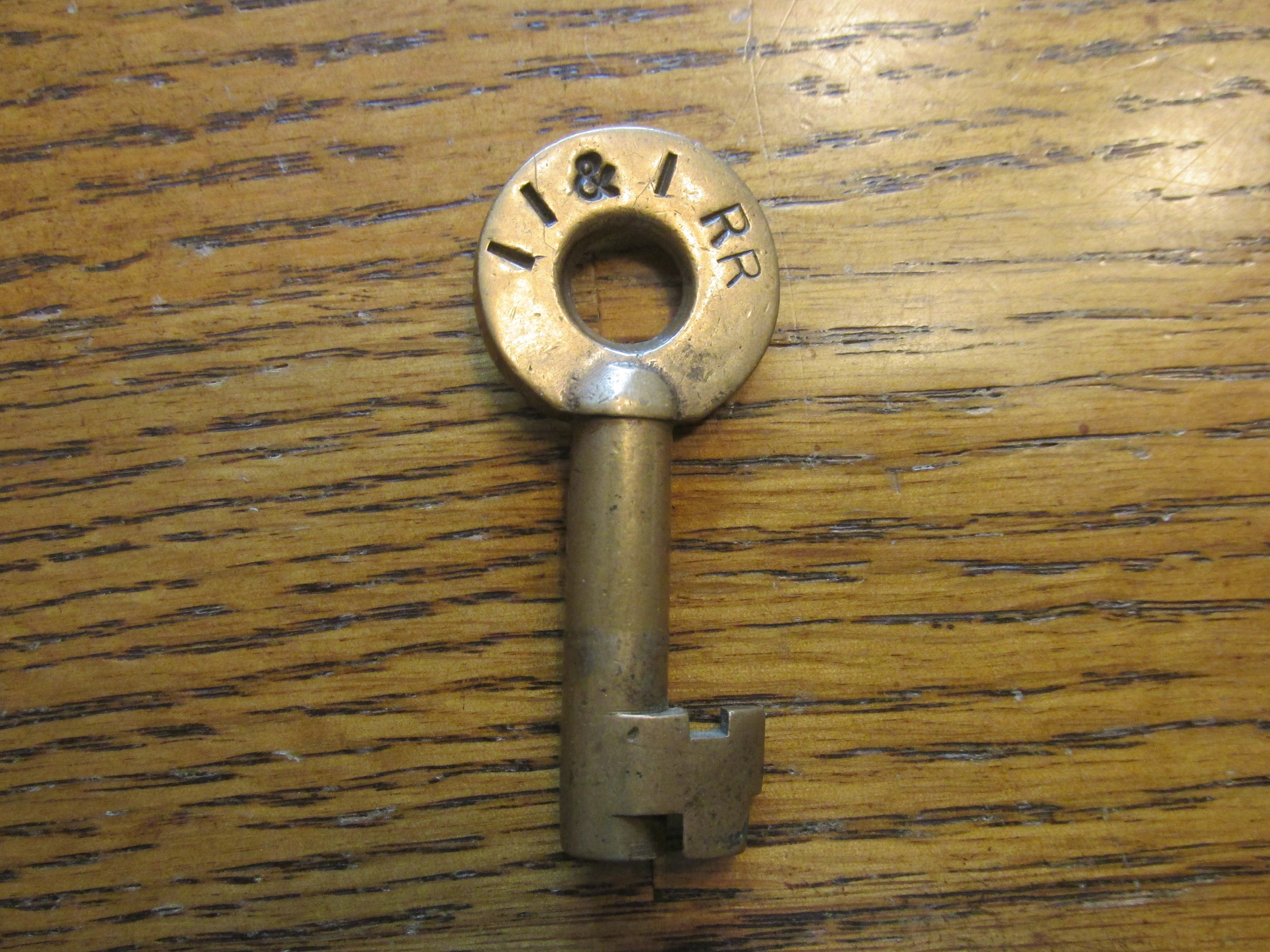Indiana Illinois & Iowa Adams & Westlake (oval) Brass Switch Key II&I