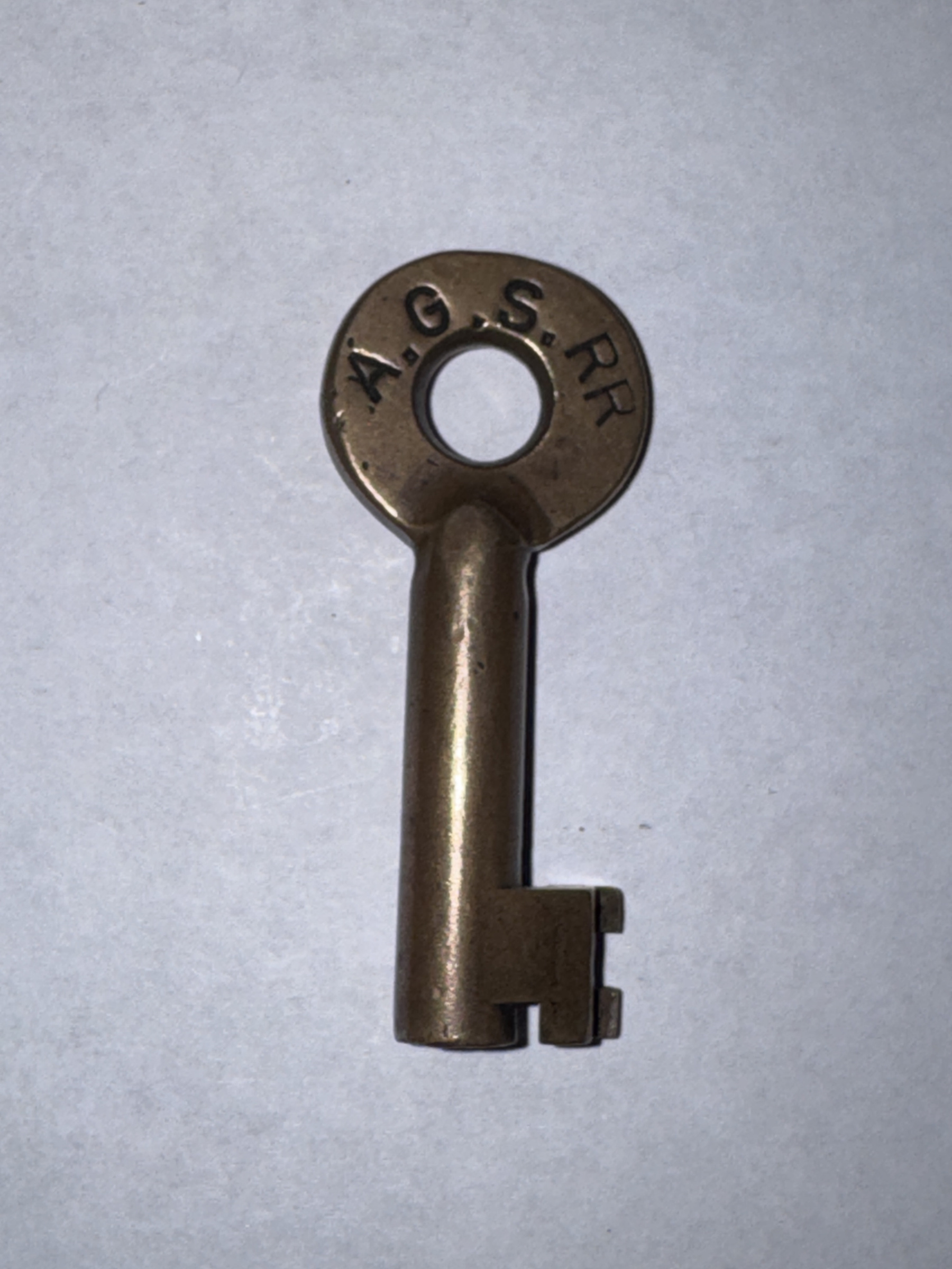 Alabama Great Southern Railroad Adams & Westlake (oval) Brass Switch Key AGS
